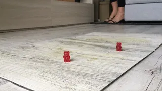 Gummy bear pressed under kitten heels