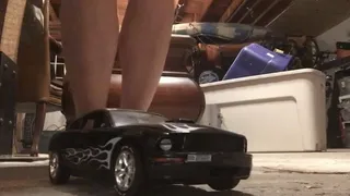 Toy car crush barefoot
