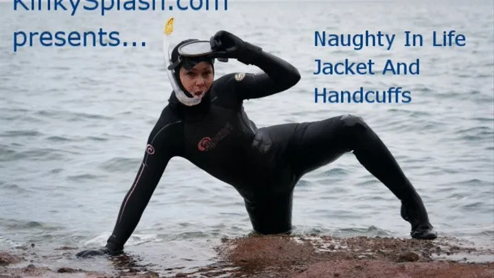 Open Water Play In Life Jacket And Handcuffs On The Beach