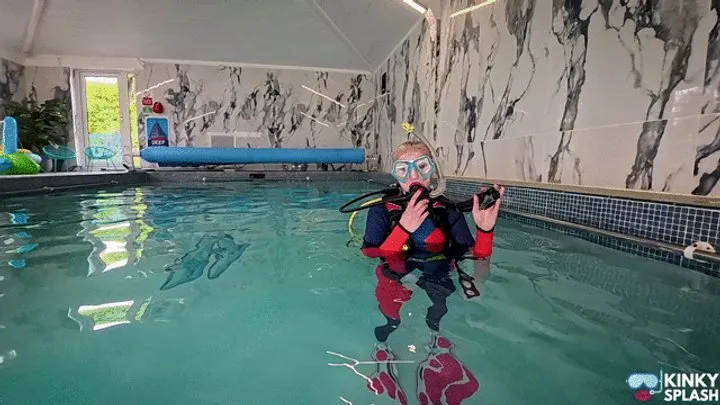 Scuba Diving Practice In Full Kit Underwater