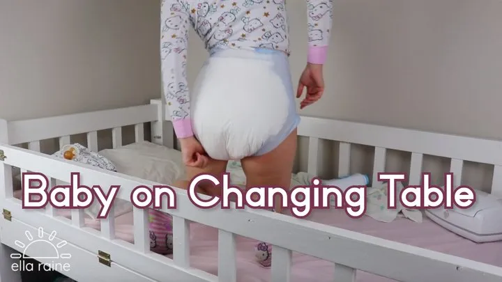 Baby Changes Diaper on Changing Table