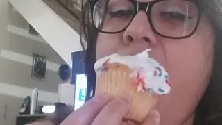 Pretty mouth eating cupcake