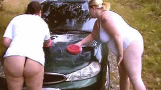 two lesbians wash car