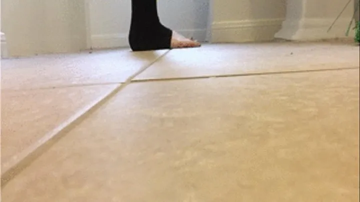 Size 10 Female Feet Doing Housework While Wearing Open Toe Leggings