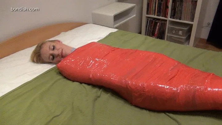 ANNA IN ENCASED IN ZENTAI CLINGFILM BONDAGE