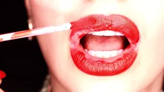 Applying Red Lipstick and Smoking hookah on black background