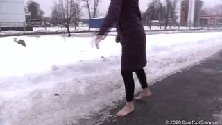 Modest Asian Aliya walks barefoot on the snow and frozen asphalt (Part 2 of 5)