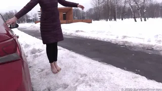 Modest Asian Aliya walks barefoot on the snow and frozen asphalt (Part 1 of 5)