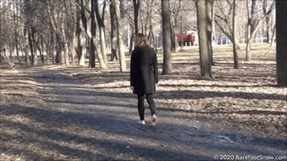 Young barefoot girl Anastasia walks on frozen ground, mud, ice and melt snow (Part 1 of 6)