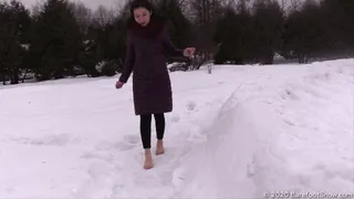 Modest Asian Aliya walks barefoot on the snow and frozen asphalt (Part 3 of 5)