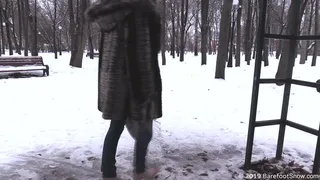Beautiful girl Alevtina walks barefoot in the winter public park for a long time (Part 2 of 6)