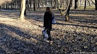 Young barefoot girl Anastasia walks on frozen ground, mud, ice and melt snow (Part 3 of 6)