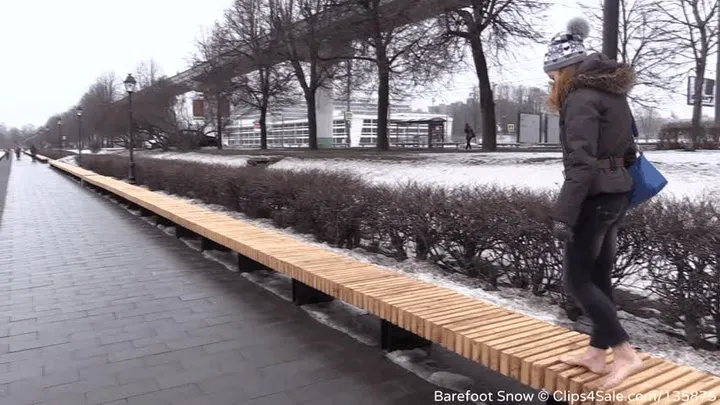 Young barefoot girl on frozen bench and ground (Full)