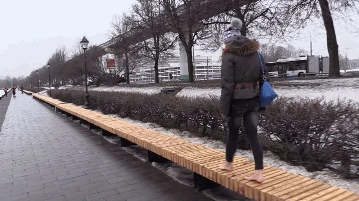 Young barefoot girl on frozen bench and ground (Part 1 of 4)