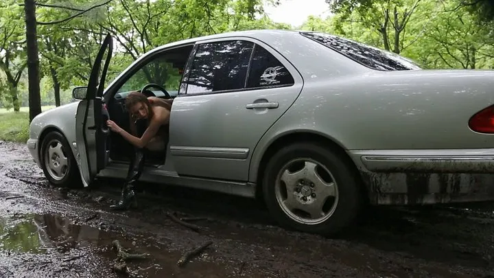 Natasha tries to drive Mercedes through muddy road and gets stuck