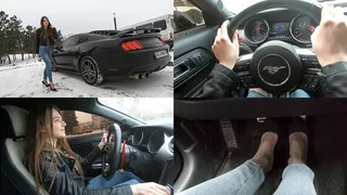 Natasha driving black Mustang