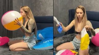 Chloe the cheater blows and pops two beach balls