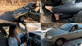 Nicki struggles on a slippery road and gets stuck