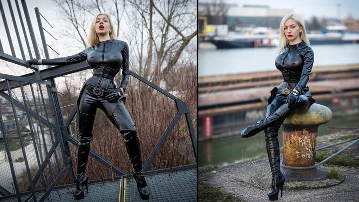 Katya walking outdoors in leather catsuit