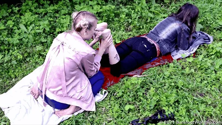 Shy poor girl Anetta licks gothic Eva's feet in a public park (Part 4 of 6)