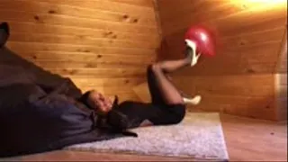 Ballon pops with high-heel