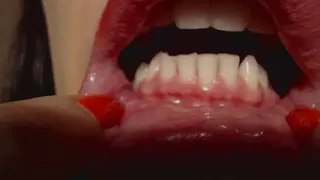 Red lips, evil teeth