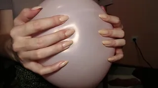 Big hands over balloon