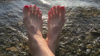Feet and soles by the sea