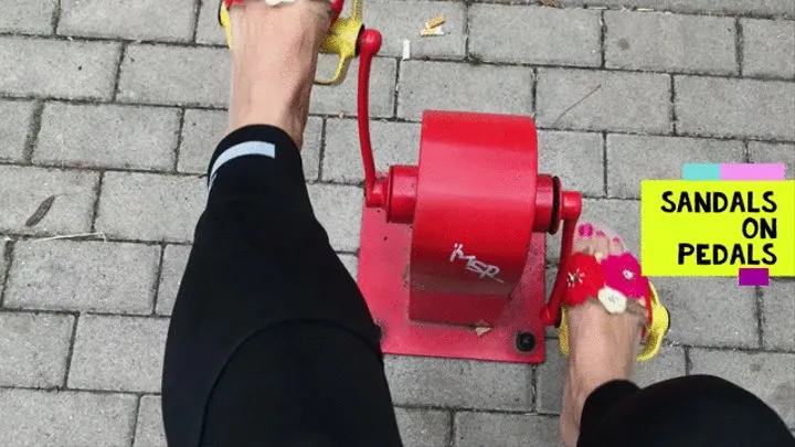 Bright sandals on pedals