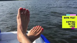 Dipping my BIG FEET off the boat