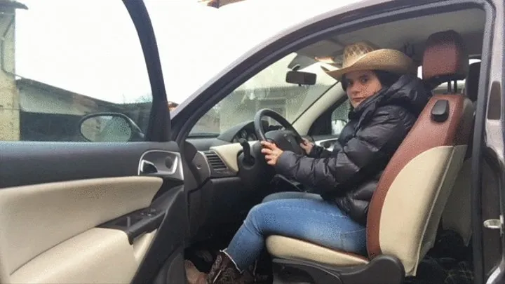 Pedal pumping of a real cowgirl with hat and cowboy boots