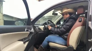 Pedal pumping of a real cowgirl with hat and cowboy boots