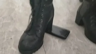 stomping on cellphone with boots with thick heel