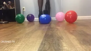 mae Popping balloons in my sexy booted heels