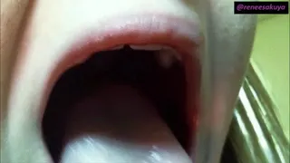 Upclose inside look of her mouth and teeth, fetish video