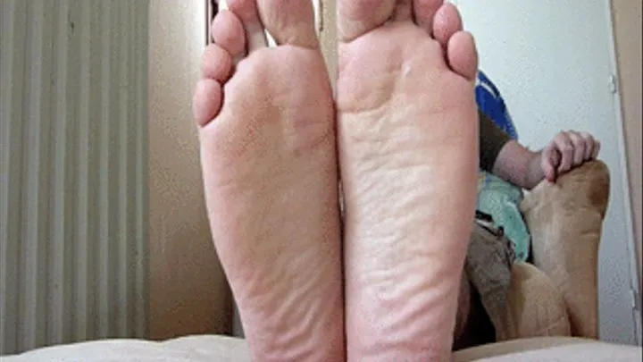 My meaty and wrinkled soles while resting on the sofa