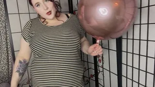 Big round balloon stuffing under dress, belly inflation