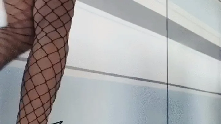 Topless Fishnets Dancing