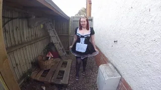 French Maid in stockings outdoors