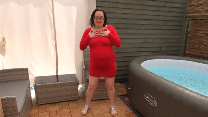 sexy step-mom showing off in red dress and sandals