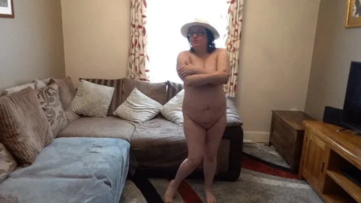 Wife dressed for summer dancing naked in just a straw hat