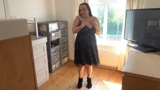 flashing in window in party dress with underskirt