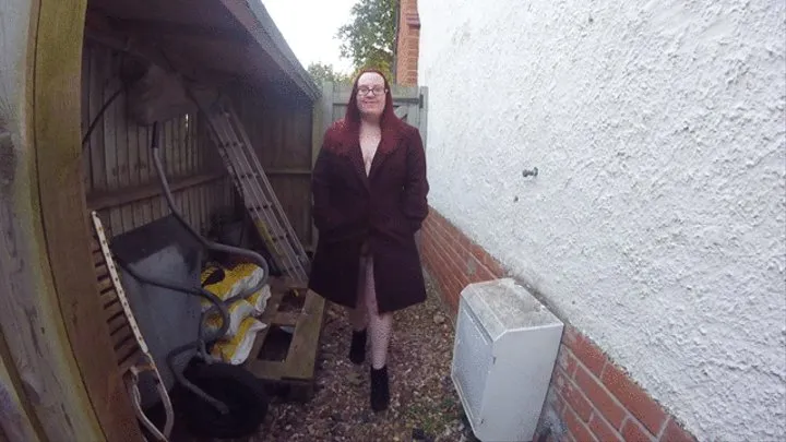 Redhead Strutting in the Yard in Ankle boots and long coat