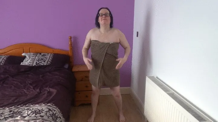 Wife dancing naked in bath towel