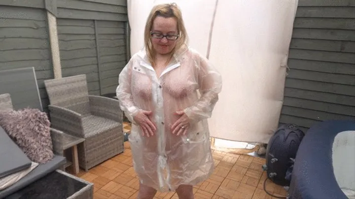 Naked under Plastic Transparent Raincoat and wellingtons out in the Cold outdoors