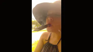 Cigar in bikini