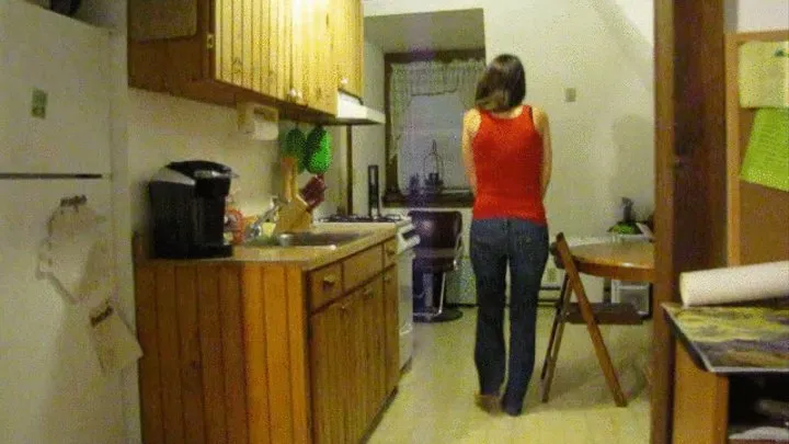 Super Sexy Brunette Pisses Her Jeans in Kitchen