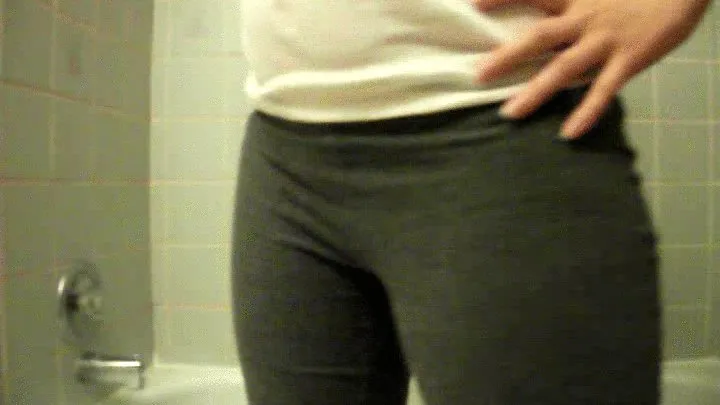 Another shy model pissing her yoga pants and panties