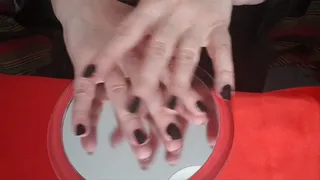 PiatheGoddess has short black nails and is fingertapping