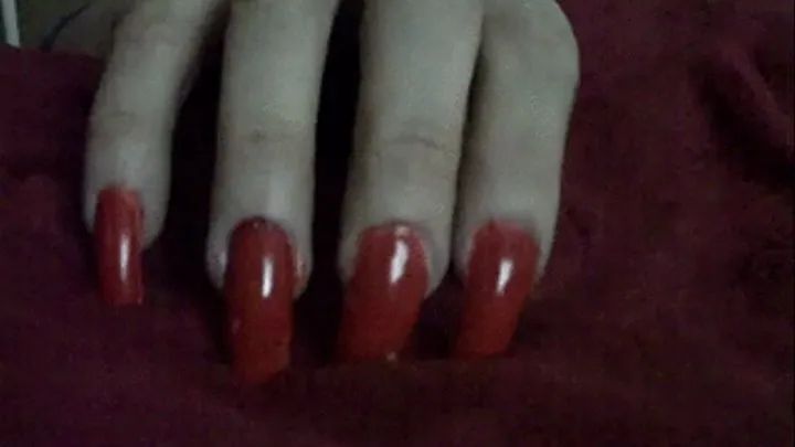 Woman with Finger Nail Fetish and nails in a light red